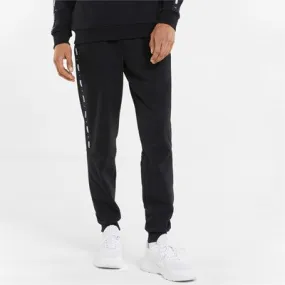 Puma fleece trousers with side band and cuff at the bottom ESS+ Tape Sweatpants FL cl 849042 01 black